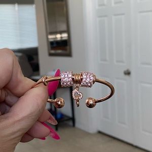 Authentic Pandora Brand New Rose Gold bracelet and charms.
